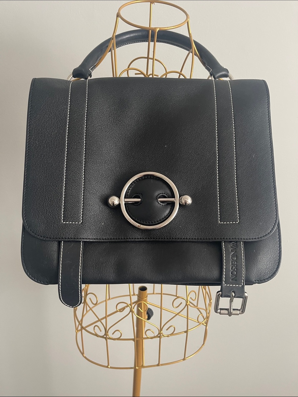 JW ANDERSON Black Leather Top-Handle Satchel with Silver Ring Detail